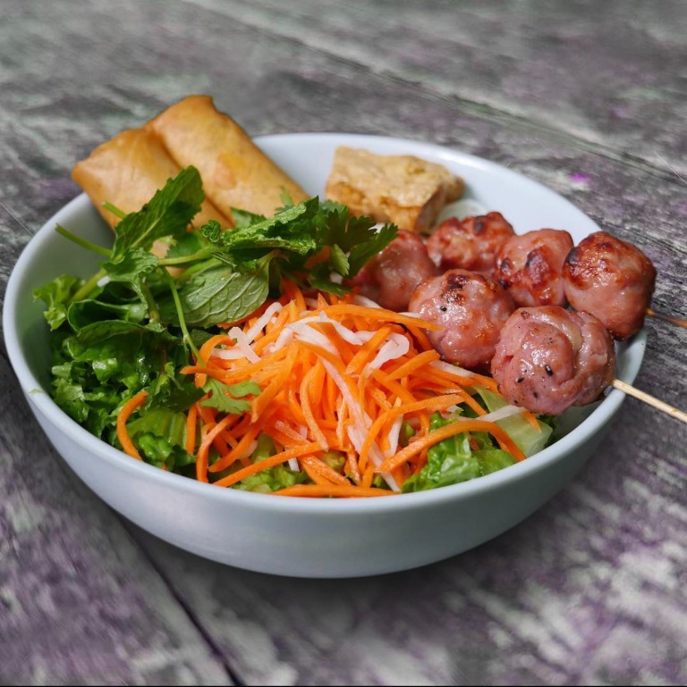 49. Pork Meatballs, Crispy Stuffed Bean Curd & Egg Roll over Vermicelli