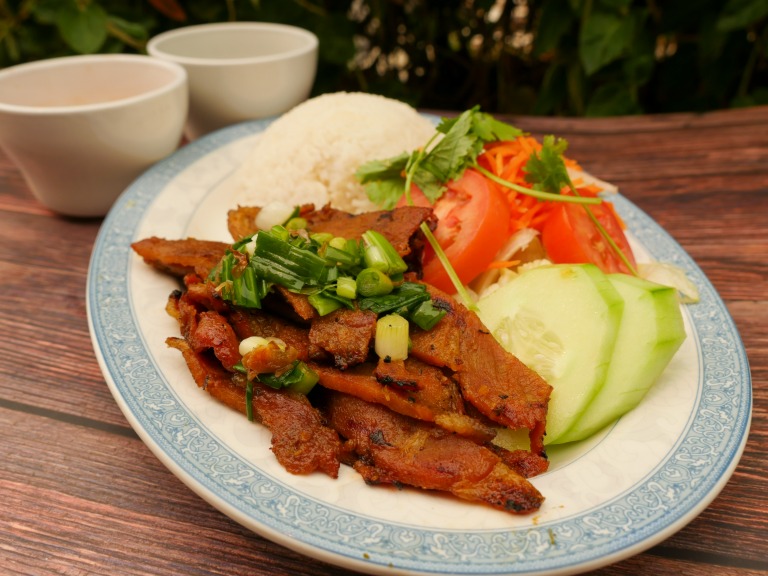 59. Choice of Charbroiled Pork, Beef or Chicken over Rice