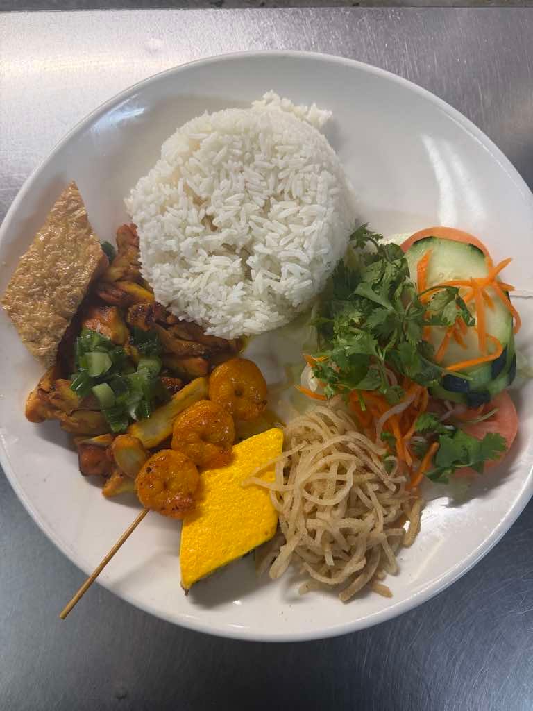 61. Charbroiled Pork, Beef or Chicken, Shredded Pork Skin, Steamed Egg Pork Patty & Shrimp over Rice