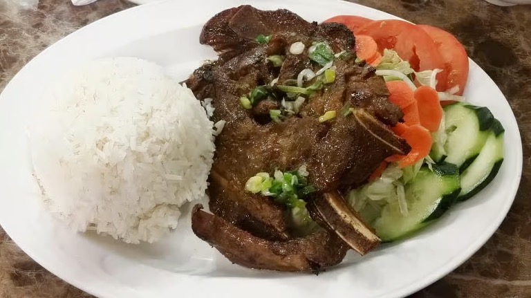 60. Charbroiled Pork, Beef or Chicken, Shredded Pork Skin & Steamed Egg Pork Patty Over Rice