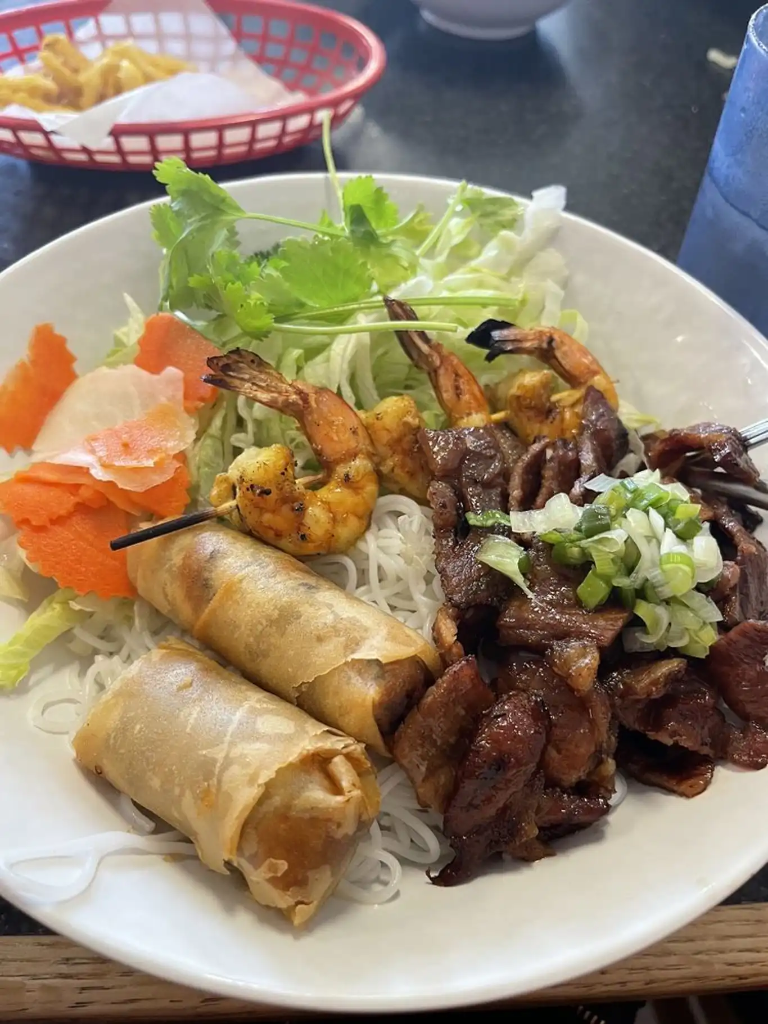 52. Charbroiled Pork, Beef or Chicken, Shrimp & Egg Rolls